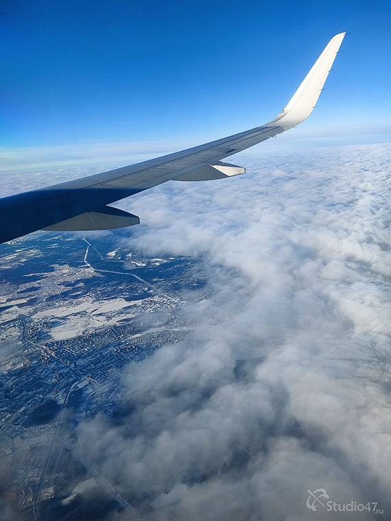 Фото вида из иллюминатора самолета